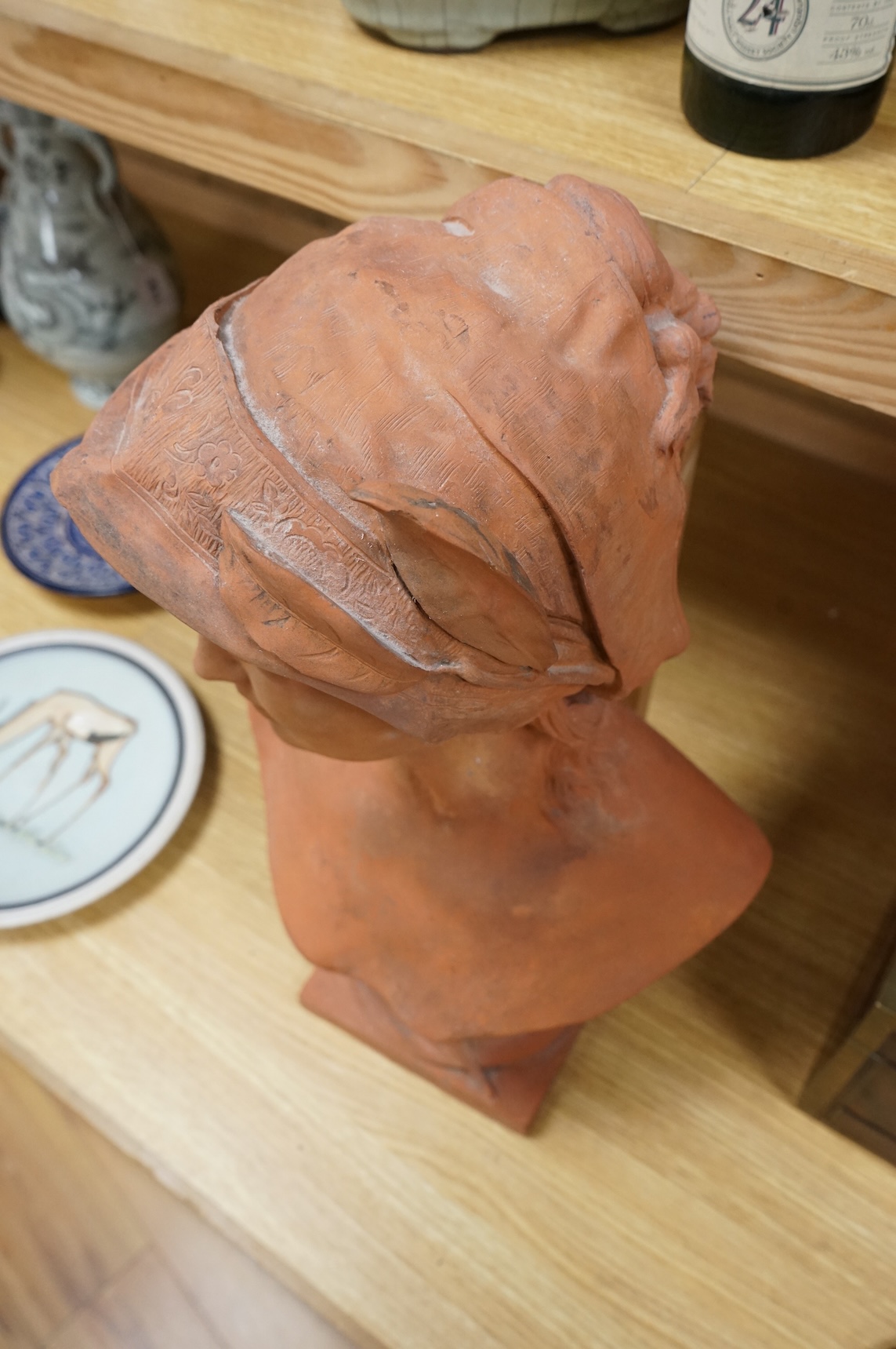 A Bretby classical terracotta bust, 51cm
